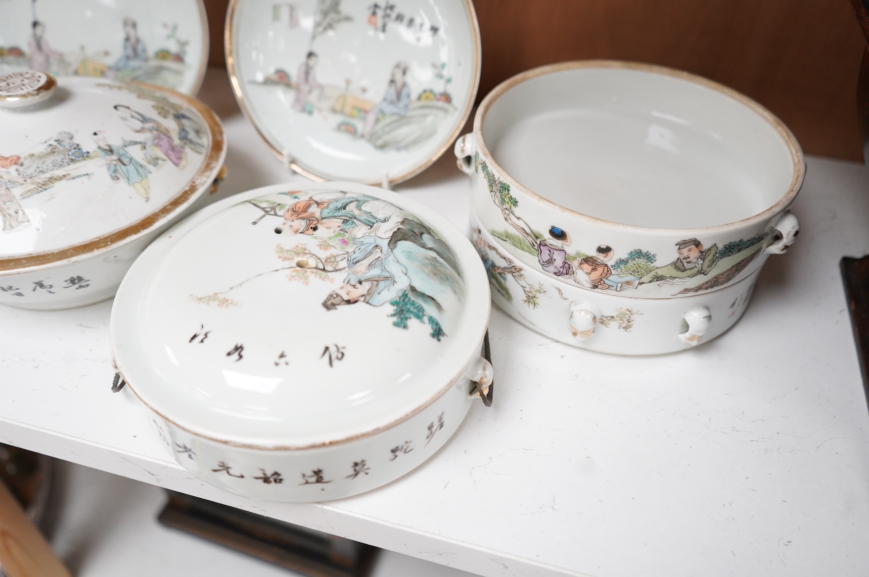 A Chinese Republic period famille rose stacking box, two dishes and a bowl and cover, largest 14cm